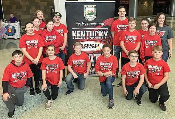 Pictured are members of the Hickman County Middle School Archery Team who recently competed at the 2019 Kentucky NASP State Tournament. Front row, left to right, Trey Boaz, Ella Terry, Bourke Dalton, Anya Dodson, William Lupton, Drew Cunningham; Allyson Parker, Callie Douglas, Coach Michele Young, Kassey Douglas, Dallas Williford, Nathan Gallimore, Lane Cunningham, Brooklyn Naranjo, Samantha Polsgrove, and Kerry Gallimore. (Photo by Becky Meadows)