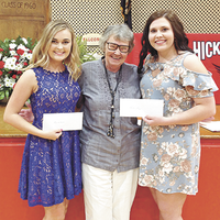 Pictured are Ruth Moss Bugg Memorial Scholarship recipient Alyssa Moore, left, presenter Jetty Pyle, center, and Clinton Wom-an’s Club Scholarship recipient Tristin Boaz, right, at the recent Hickman County High School Honors Night. Moore received the Bailey &amp; B Photography Scholarship. Boaz was also the recipient of the James H. Phillips Memorial Scholarship. (Photo submit-ted)