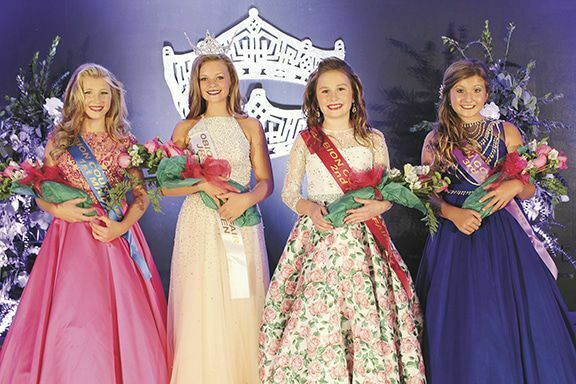 JUNIOR MISS — Laney Kay Stokes , second from left, 11, of Union City, Tenn., was crowned Junior Miss Fairest of the Fair Monday night. She is the daughter of Lacy and Troy Stokes and is a student at South Fulton Middle School. Her court included first maid Ivy Kate Morris (left), 10, of South Fulton, daughter of Rob and Jamie Morris and a student at South Fulton Elementary; second maid Clara Pryor (third from left), 10, of Union City, daughter of Jessica and Guy Pryor and a student at Union City Middle School; and third maid Kailey Ring, 12, of Samburg, daughter of Jeremy and Keisha Mosley and a student Black Oak School. (Photo courtesy of The Union City Messenger)