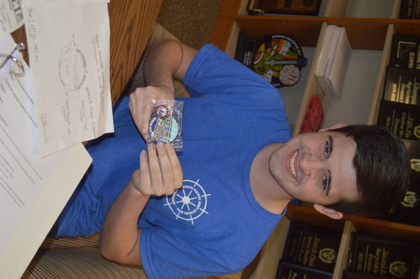 Pitts displays the SFHS Beta Club pin designed by Club members which will be entered in the National Beta Club Convention competition in Savannah, Ga. this summer. (Photo by Benita Fuzzell)