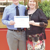Chase Boaz was the recipient of the Red Cross Scholarship, presented by Karen Stairs, right, at the recent Hickman County High School Honors Night. (Photo submitted)