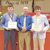 Johnathon Humphreys, left, and Jakob Stahr, right were the recipients of the Hurd/Bolin FFA Memorial Scholarship at the recent Hickman County High School Honors Night. Darian Irvan, center, was the presenter. (Photo submitted)