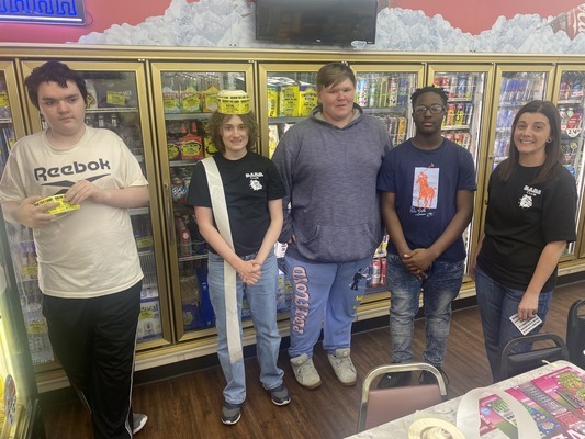 Pictured left to right are FHS BADD Club members Daryl Wood, Ethen Penney, Jordan Whitman, Keith Jordan, and ASAP coordinator Kimberly Brann, who recently participated in a project to draw attention to responsibilities with alcohol purchases. (Photo submitted)