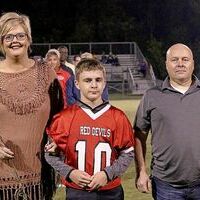 Pictured are South Fulton Middle School football player Gage Adams, center, and his escorts being honored at the recent Eight Grade Night.