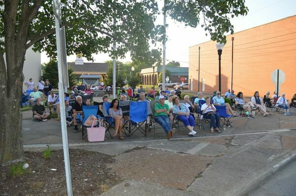 A crowd of over 100 brought lawn chairs to the blocked off section of downtown Fulton's Lake Street on Saturday evening, for a free concert, provided by Fulton Tourism Commission. (Photo by Benita Fuzzell.)