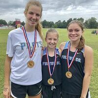 VARSITY GIRLS MEET – Fulton County runners Marlena Sipes, left, finished 10th, Emma Madding, center, 20th place, and Callie Coulson, right, 21st, participated in the Calloway County Invitational held Sept. 8 at Calloway County High School. (Photo submitted)