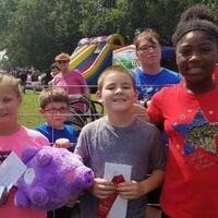 Fourth-Fifth grade Greased Pig Contest winners -- Jadyn Rushing, Ethan McDonald and Jamesha Brown were the first three fourth through fifth graders to catch a greased pig during the Banana Festival contest on Saturday.