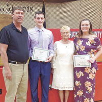Dalton Jewell, second from left, and Anna Ferguson, far right, were the recipients of the Jerry Lacewell Memorial Scholarship at the recent Hickman County High School Honors Night. Keith Lacewell, far left, and Joan Lacewell, second from left, were the presenters. (Photo submitted)