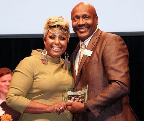 CHAMBER FINALIST – PaTrice Chambers, left, assistant superintendent at Fulton County Schools, is named a finalist in West Kentucky Community and Technical College’s Third Annual Regional Educators Awards and Scholarship Program March 5. WKCTC President Anton Reece, right, presented the award to her. (Photo submitted)