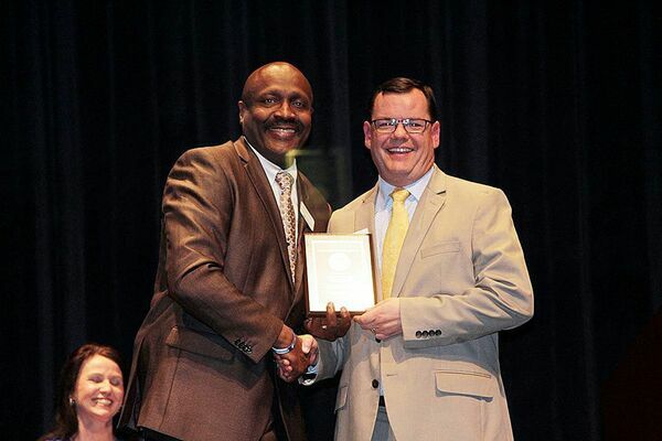 COLLINS PRESIDENT’S AWARD RECIPIENT – Fulton County Superintendent Aaron Collins, right, was one of four recipients presented with the 2020 President’s Award by WKCTC President Anton Reece during the Third Annual Regional Educators Awards and Scholarship Program March 5. (Photo submitted)