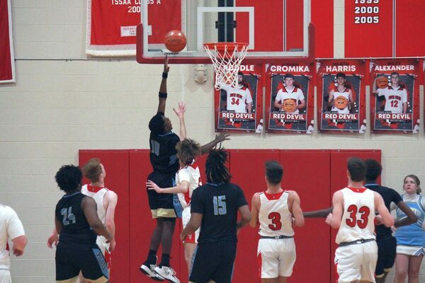 Fulton County Pilot Willie Campbell goes up for a lay-up against the South Fulton Red Devils Dec. 13. Campbell had seven points in the 66-44 Pilots victory. (Photo by Jackson Doss)