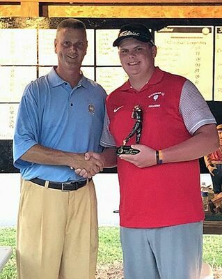 Pictured is Mike Kehoe, PGA Professional, left, presenting Tyler Abernathy, right, with his fourth place trophy. (Photo submitted)