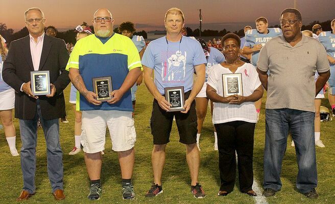 INDUCTED – Fulton County High School recently added four new members into their Athletic Hall of Fame. During ceremonies held at Sanger Field, induction was held for, left to right, Cubb Stokes, baseball, football, basketball; Jim Somerfield, football; Rick Major, football; and the late Andra’ Curtis, football. Receiving the honor for Curtis was his mother, Mary Ruth Cheirs and step-father Joe Cheirs Sr. (Photo by Charles Choate)
