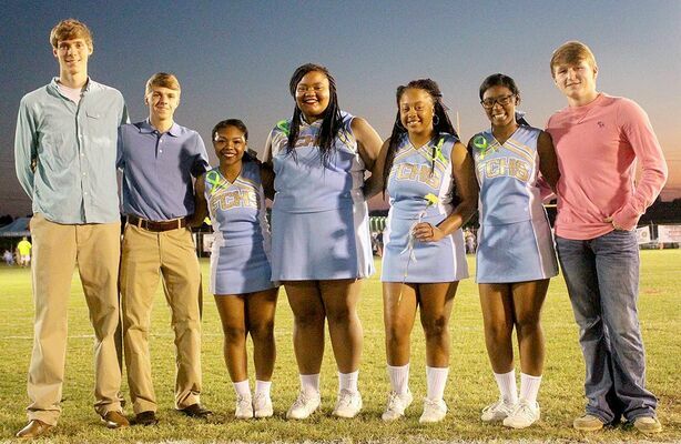 SENIOR PILOTS – Fulton County High School honored these Seniors during recent ceremonies at Sanger Field. Pictured left to right are Camden Aldridge and Isaac Madding, cross country; Jamila Hagler, Taniah Wilson, Kanisha Wooten, and TaShayah Freeman, cheerleaders; and Damyen Goodrich, golf. (Photo by Charles Choate)