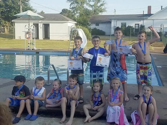 safe swimmers – Pictured are the July 23-27 Swim Class Level 1 participants, left to right, Emmett Weatherford, Ward Burnette, Allison Lindsey, Raden Lux Woodruff, Molly Linder, Katie Grace Joyner, Maci Jo Pyle; back row, Levi Simpson, Jake Foy, Isaac Simpson, and Vinn Lowry. Instructors Ann Bard and Sharye Hendrix taught the class at the Fulton Country Club. (Photo submitted)