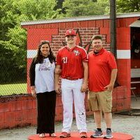 SENIOR NIGHT FOR THE RED DEVILS – Eli Carlisle and his parents, Brittney and Chris Carlisle received recognition during the recent honoring of senior Red Devil baseball players. (Photo by Jake Clapper)