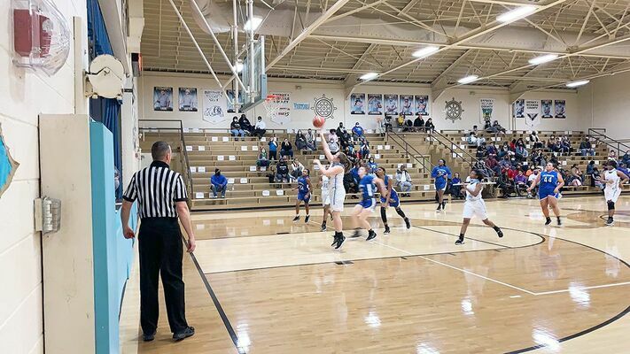 A Lady Pilot attempts a lay-up off a fast break against the Paducah Tilghman  Blue Tornadoes Jan. 15. (Photo by Mark Collier)