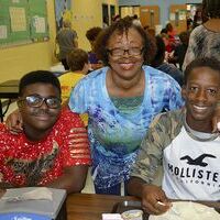 LUNCH TRIO - Grandparents were honored Sept. 7 at Fulton County Elementary School and Fulton County Middle School, ages kindergarten through eighth grade. Rez Westbrook, Rhonda Dinwiddie, and Wesley Brown enjoyed spending time together during lunch. (Photo by Barbara Atwill)