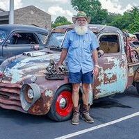 HICKMAN COUNTY FAIR CAR SHOW WINNER – Shayne Key of Mayfield, Kentucky won the best rat rod class in the First Annual Hickman County Fair Cruisin’ Car Show.  The trophy was created and donated by Andrea Thompson, a student at the Paducah Area Technology Center. (Photo by Becky Meadows)