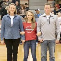 SFMS EIGHTH GRADE RECOGNITION NIGHT – Lilly Holzner, SFMS Lady Red Devil basketball team member and her parents, Tara and John Holzner, were honored last week during the South Fulton Middle School Basketball Eighth Grade Night recognition ceremony.