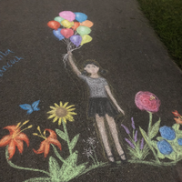 Bella Hancock of Fulton was the First Place winner in the Banana Festival chalk art contest held during the Faith and Family event Wednesday evening.