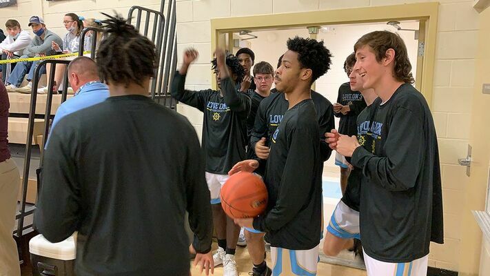The Fulton County High School Pilots prepare to take the floor before their home game against Paducah Tilghman Jan. 15. (Photo by Mark Collier)