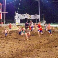 GOOD, “CLEAN” FUN AT THE FAIR – Following the mud races Aug. 4, the kids in attendance at the fair had a foot race down the track at the Hickman County Fair grounds. (Photo by Becky Meadows)