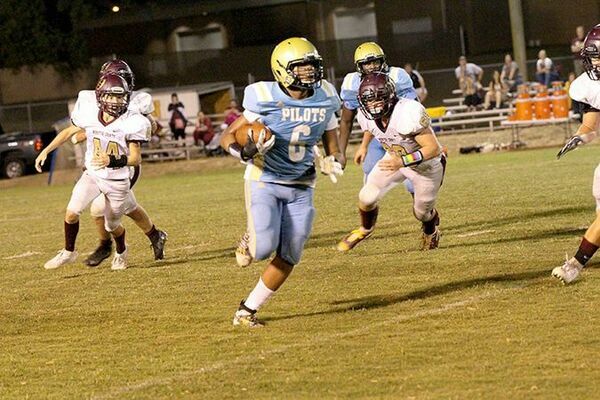 TD RUN – Pilots running back Diavian Bradley (6) heads to the endzone during the third quarter of their game against Webster County. Bradley rushed for 103 yards and two touchdowns in Fulton County’s 62-49 win at home. (Photo by Charles Choate)