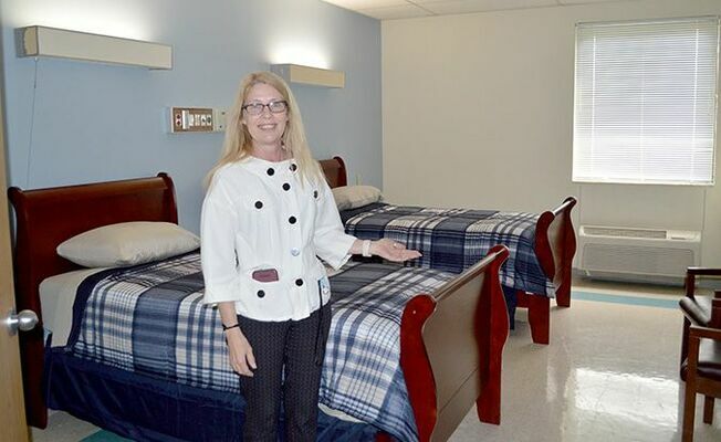 CREATING CHANGES – Shirley Jankowski, Phd, MBA, NHA, CDP is the Program Director for Changes Rehabilitation, the rehab facility now located in the former location of Parkway Regional Hospital in Fulton. The opening of the 60 bed center is expected to take place in mid to late Summer. Jankowski is shown in one of the recently renovated residential rooms at the facility. (Photo by Benita Fuzzell.)