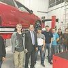 Kentucky First District Representative Steven Rudy (third from left)
toured the Fulton County ATC on May 3, while attending the Steering
Committee meeting. The car in the background is one of nine Toyota
donated to ATCs in Hickman, Murray/Calloway County, and Paducah,
with each campus receiving three cars. Shown with Rudy are students
from Fulton and Hickman counties. (Photo submitted)