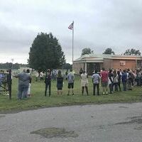 PRAYING AT THE POLE – Four Rivers Career Academy hosted a “See You at the Pole” Sept. 26 at the flagpole on the front lawn. Students, faculty, and community members came together for the annual event. (Photo submitted)