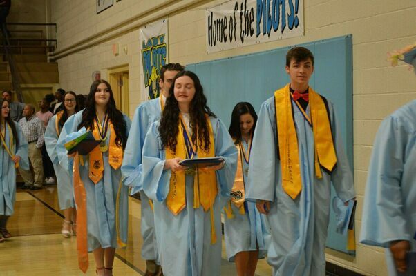 FINAL WALK - Members of the Fulton County High School Class of 2022 take the final walk following graduation in the high school gymnasium on May 27. (Photo by Barbara Atwill)