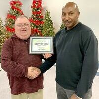 OVER TWO DECADES OF SERVICE – Sam Jones, a Driver with Fulton County Transit Authority for 26 years, was recognized for his service by FCTA Executive Director Kenney Etherton during the recent awards banquet. (Photo submitted. )