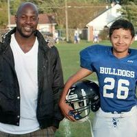 EIGHTH GRADE NIGHT RECOGNITION – Pictured is Fulton Independent Middle School 8th grade football player, Adrian Cons, right, and his step-father, Glenn Dickerson. Cons was honored at the recent Eighth Grade Night. (Photo submitted)