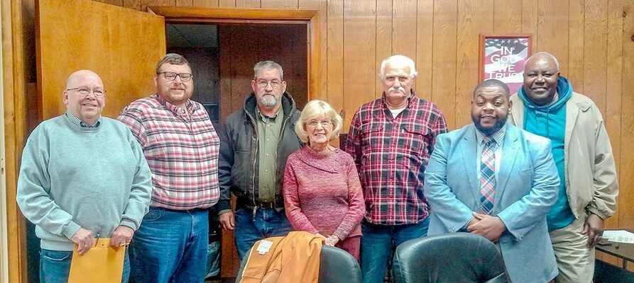 SWEARING IN – Newly elected city officials were sworn in following the Clinton City Council meeting Dec. 3. Pictured, left to right, are Council members Tommy Kimbro, Chad Frizzell, Mayor Fred Cox, Council members Betty Morrow, John Kelly, Alex Thomas, and Howard Dillard. (Photo by Becky Meadows)