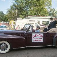 Grand Marshal "Rabbit" Cruce waved to the crowd during Saturday's Banana Festival Grand Parade. Cruce was named Chamber of Commerce Citizen of the Year earlier this year.