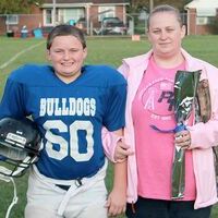 EIGHTH GRADERS HONORED – Pictured is Fulton Independent Middle School 8th grade football player Tristan Lalley, left, and his mother, Shena Cox. Lalley was honored at the recent Eighth Grade Night. (Photo submitted)