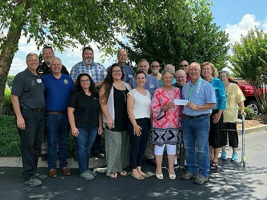 Hickman Rotarians contribute to PTSO's playground project