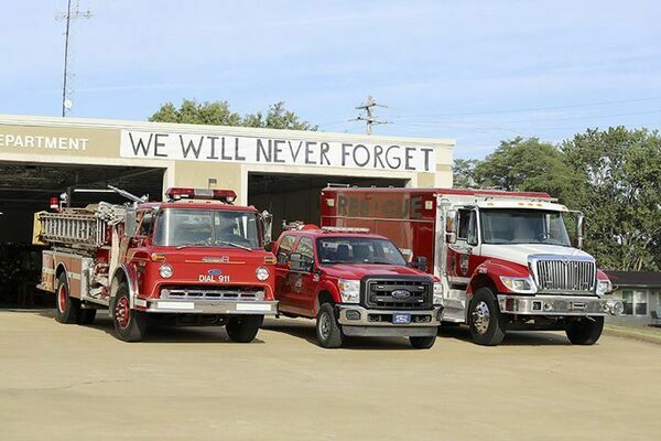 9/11 TRIBUTE – South Fulton Fire Department personnel paid tribute to first responders and emergency crews who lost their lives during the 9/11 attacks in 2001 by posting a sign noting “We Will Never Forget”. (Photo submitted)