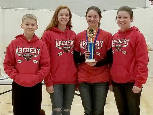 Pictured are Hickman County Middle School Archery Team members James Clark, Cora Clark, Callie Douglas, and Kassey Douglas with their 3D trophy. (Photo submitted)