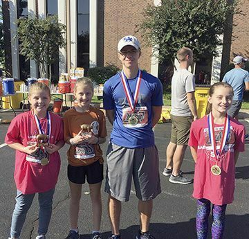 BARBECUE ON THE RIVER – Fulton County was represented in the Barbecue on the River 5K Run on Sept. 28. Pictured are McKayden McClure, Chloe McClure, Isaac Madding and Emma Madding. (Photo submitted)