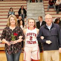 LADY RED DEVILS’ SENIORS SPOTLIGHTED – Sophia McMinn, SFHS senior basketball player, was honored along with her parents, Mark and Allison McMinn, during the South Fulton High School Senior Night Feb. 13. (Photo by Jake Clapper)