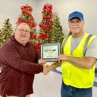 DRIVER HONORED – Roger Barnes, a Driver for Fulton County Transit Authority for six years, was recognized by FCTA Executive Director Kenney Etherton, and honored during the Dec. 20 awards banquet.