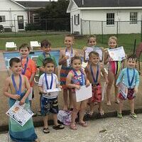 CERTIFIED SAFE SWIMMERS – Area children who recently completed swim safety classes, Level 1, taught by instructors Ann Bard and Sharye Hendrix at Fulton Country Club July 2-6 included front row, left to right, Micah Cates, Rivers Parks, Madison Parks, Carter Martinek, Davis Lyndon; back row, Conner Williams, Asher Lusk, Eli Cates, Billie Ann McCoy, and Benson White. (Photo submitted)