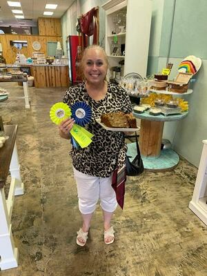 Claudette Hernandez of Fulton, earned first place for banana bread and overall winner with her $100 banana nut cream bread.