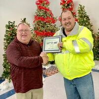 SIX YEARS OF SERVICE – Mike Reilly, Driver for Fulton County Transit Authority, was recognized by FCTA Executive Director recently, for his six years of service. Reilly was recognized during the Dec. 20 awards banquet. (Photo submitted. )