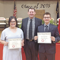 Western Kentucky University scholarship recipients were Cassidy Luker, left, and Hunter LeBlanc, right. Kevin Estes, center, was the presenter at the recent Hickman County High School Honors Night. Luker received the Tennessee Grocer’s Educators Foundation Scholarship. LeBlanc also received the St. Jerome Catholic Church Scholarship. (Photo submitted)