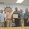 SERVICE APPRECIATED – The Hickman City Commission presented Police Officer Ray Smith with a Certificate of Appreciation for recognition of 28 years of service to the Hickman Police Department at the City Commission meeting June 11. Smith said, “I never thought it would be 28. It has been some hard days and some good days and if I had it to do over again I still would become a police officer. It is in my blood.” Smith has also served in the National Guard and regular Army for 20 years. Smith received three DD214 as a Vietnam veteran, Persian Gulf, and Iraq, serving in the Navy. From left are Commissioner Heath Carlton, Mayor David Lattus, Smith, Commissioner Phillip Williams, and Hickman Chief of Police Tony Grogan. (Photo by Barbara Atwill)