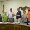 Fulton City Manager Cubb Stokes, third from left, was honored June 25, during his final Fulton City Commission meeting, as City Manager, and presented with an engraved brick to be placed in Pontotoc Park. On hand were Commissioners Martha Vowell, Elaine Forrester, Mayor David Prater, Darcy Linn and Jeff Vaughn. (Photo by Benita Fuzzell)