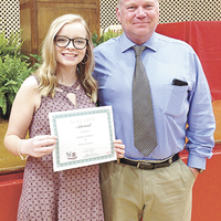 The Westlake Chemical Scholarship was awarded to Camryn Jackson, left, by Jeff Jackson, right, who is a Westlake employee and Camryn’s father at the recent Hickman County High School Honors Night. (Photo submitted)